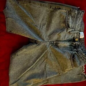 Gray and black ripped jeans